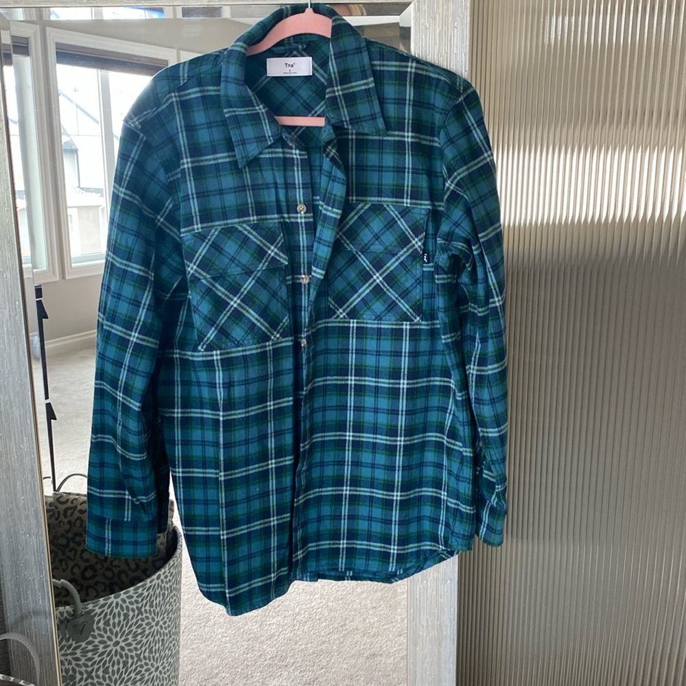 TNA green check shacket with front pockets. Size small in excellent condition